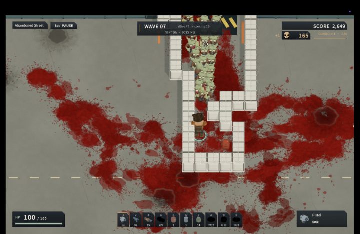 A survivor stands behind rows of barricades while zombies press through the narrow opening.
